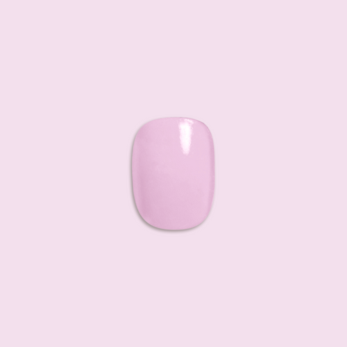 Cockatoo - Press-On | Extra Short | Round false nail in glossy glowy lavender with a touch of pink for easy at-home mani.