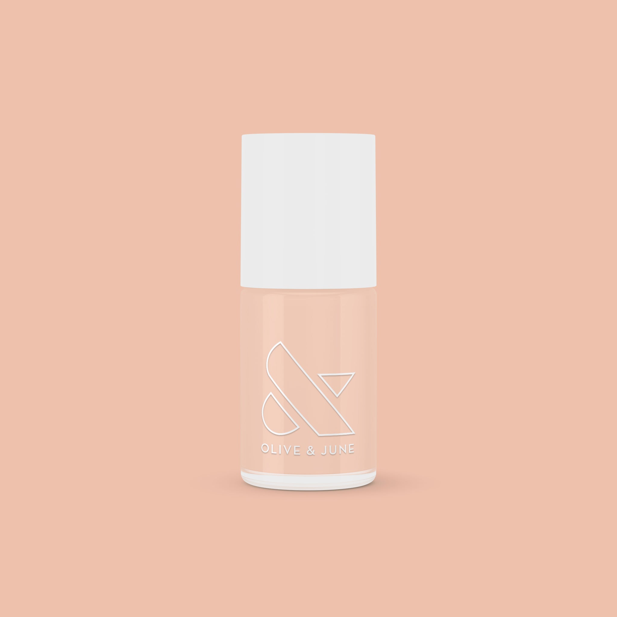 KAG nail polish bottle in neutral peachy pink shade on matching peach background for a fresh mani or pedi
