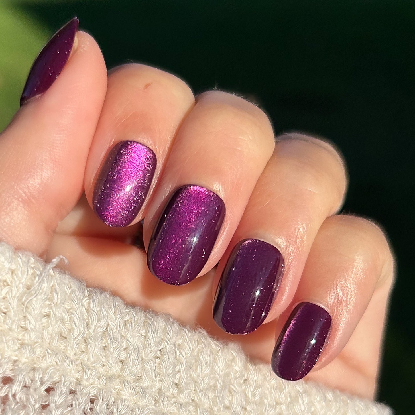 Velvet Plaza - Press-On | Extra Short | Round deep mulberry chrome velvet finish press-on nails on hand outdoors