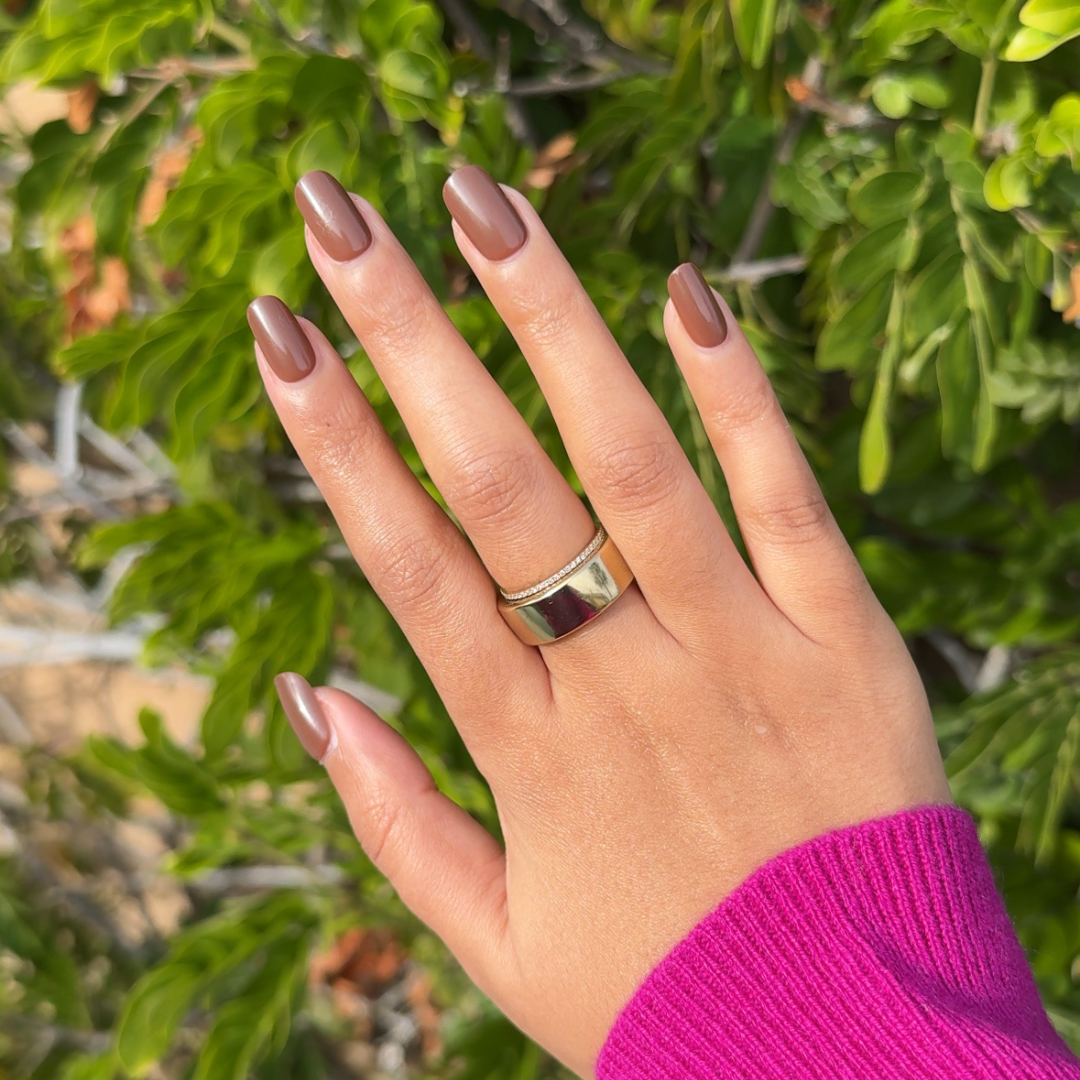 Americano | Short | Squoval - Tab Press-On featuring coffee brown short false nails on hand with silver ring outdoors