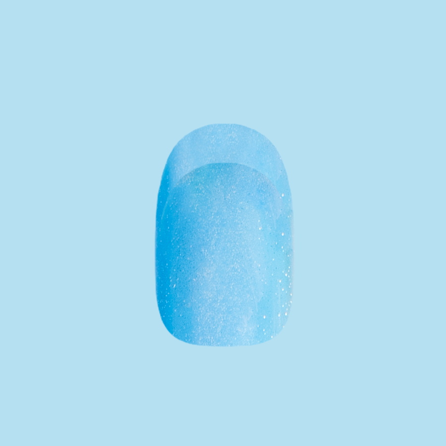 Axolotl Velvet Illusion French - Press-On | Short | Round showing shimmering blue velvet false nail with subtle French tip design
