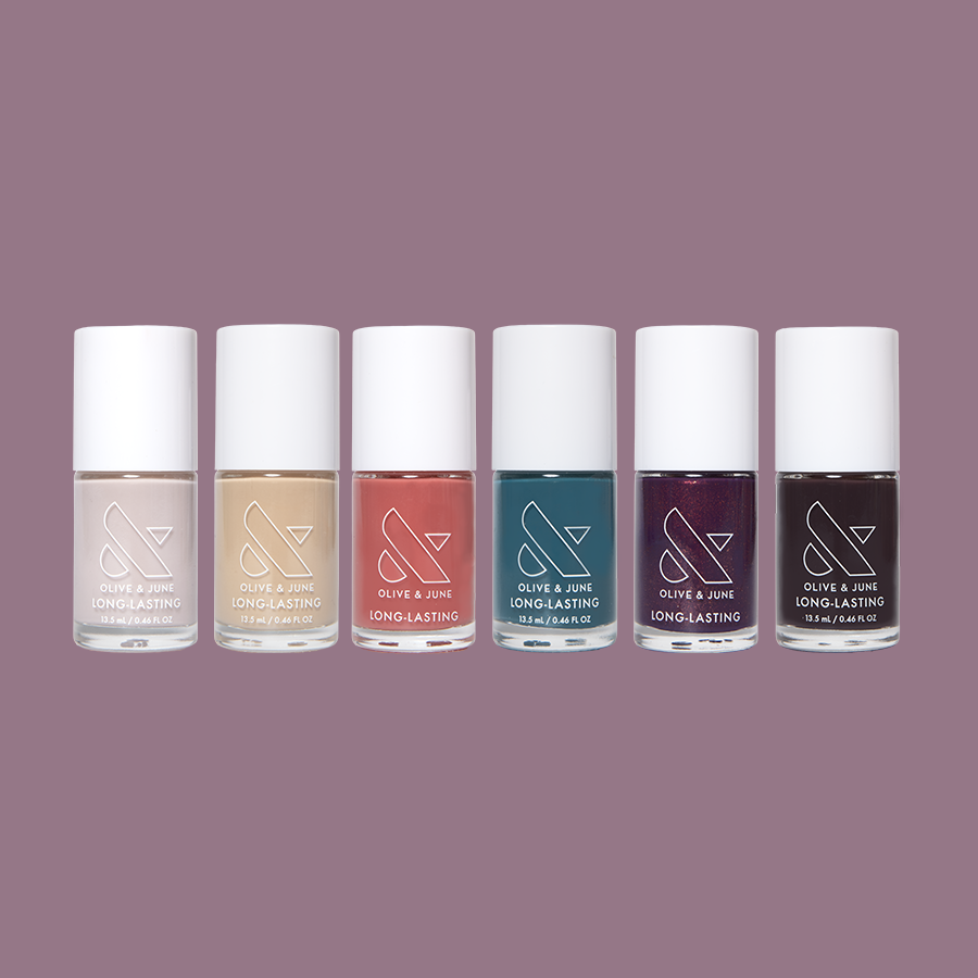 Bonus Fall Long-Lasting Polish Set featuring six fall-inspired nail polish shades in sleek bottles by Olive and June