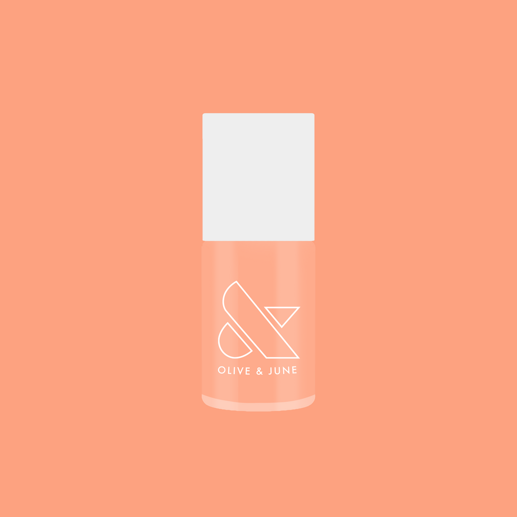 Bottle of It’s Serving Melon Cocktails nail polish in soft pastel melon shade for fresh, long-lasting at home manicure looks