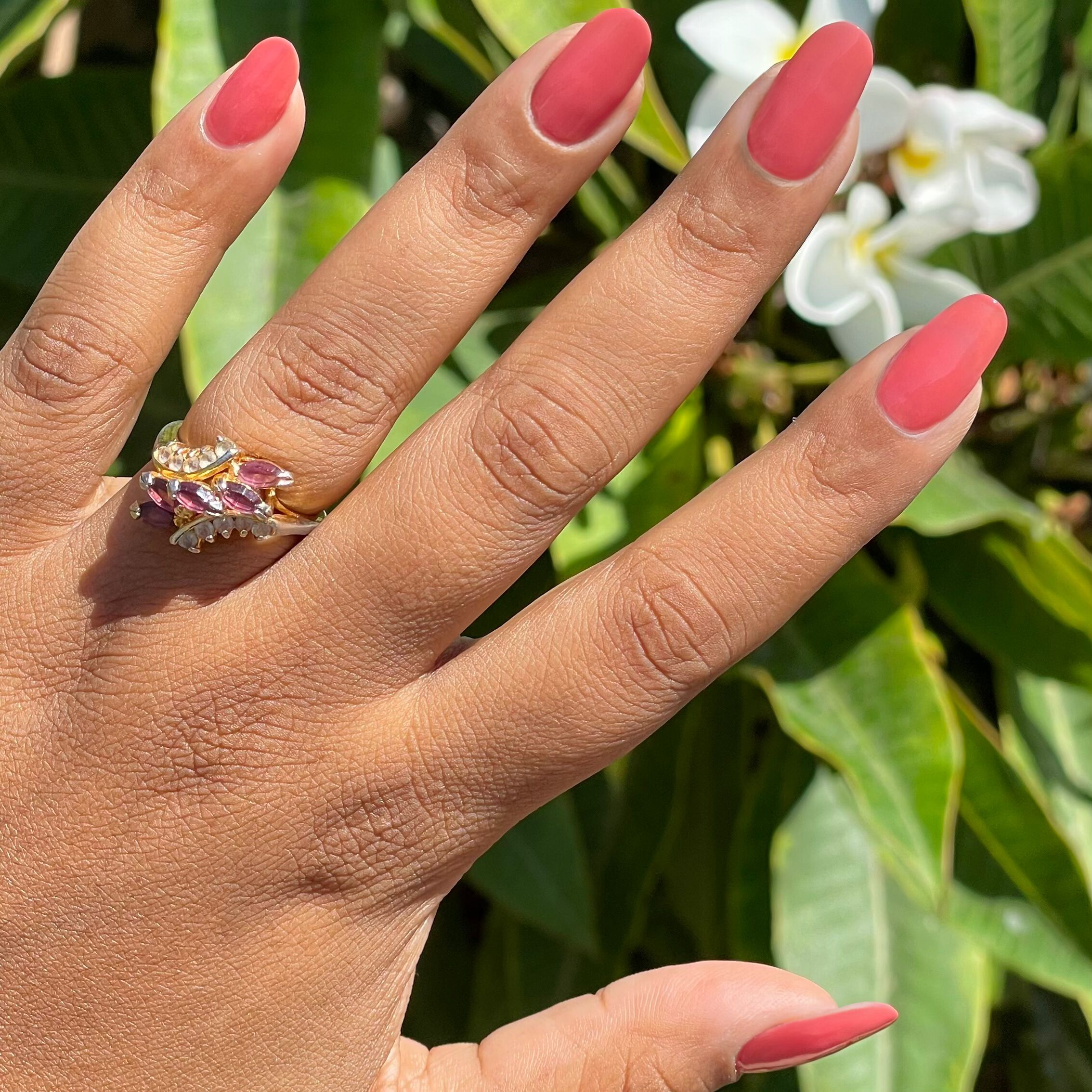 Boysenberry Glass gel polish on medium-length nails showing a sheer berry jelly manicure in natural light by Olive and June