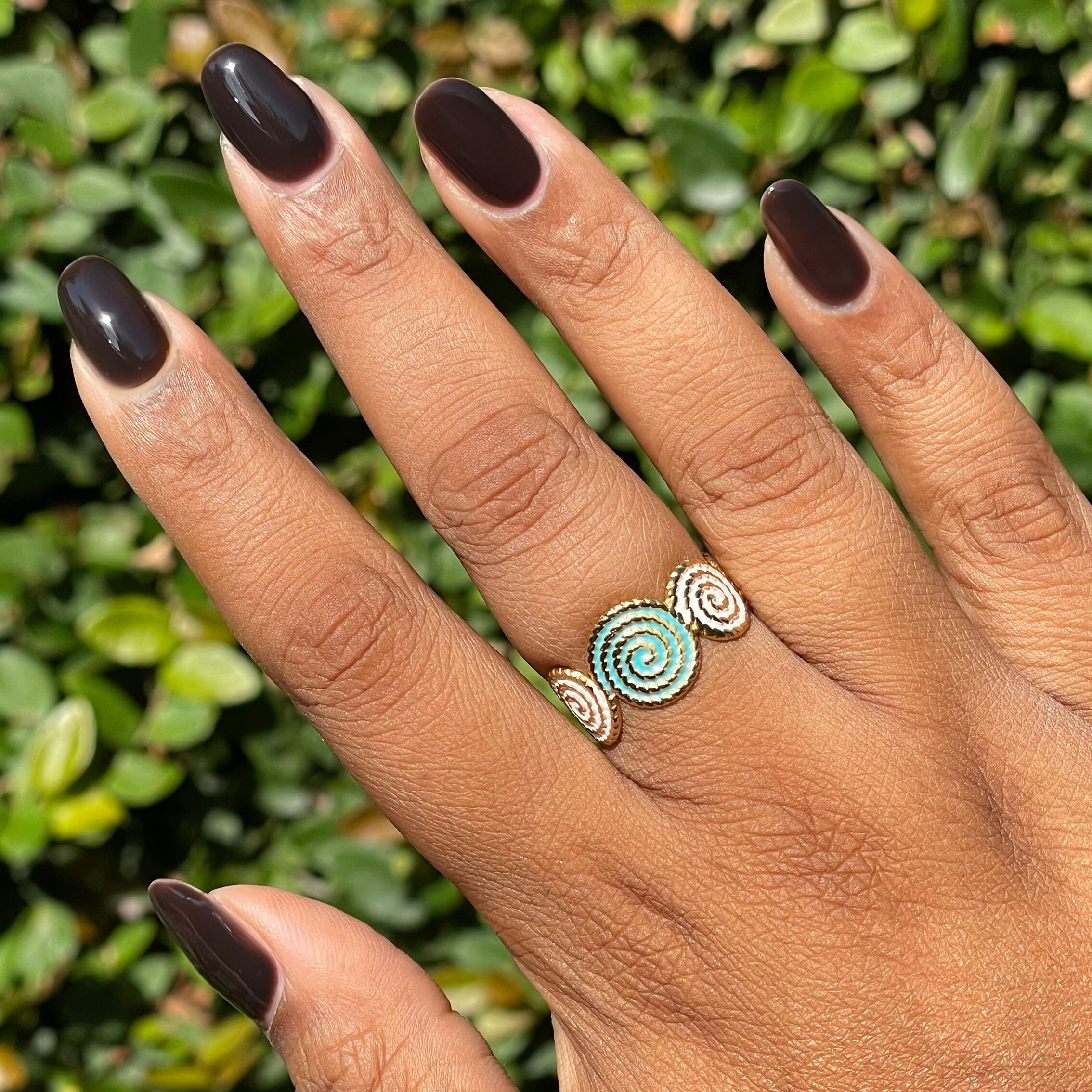 CN - Gel polish on medium-length nails showing a deep silky sable brown manicure by Olive and June