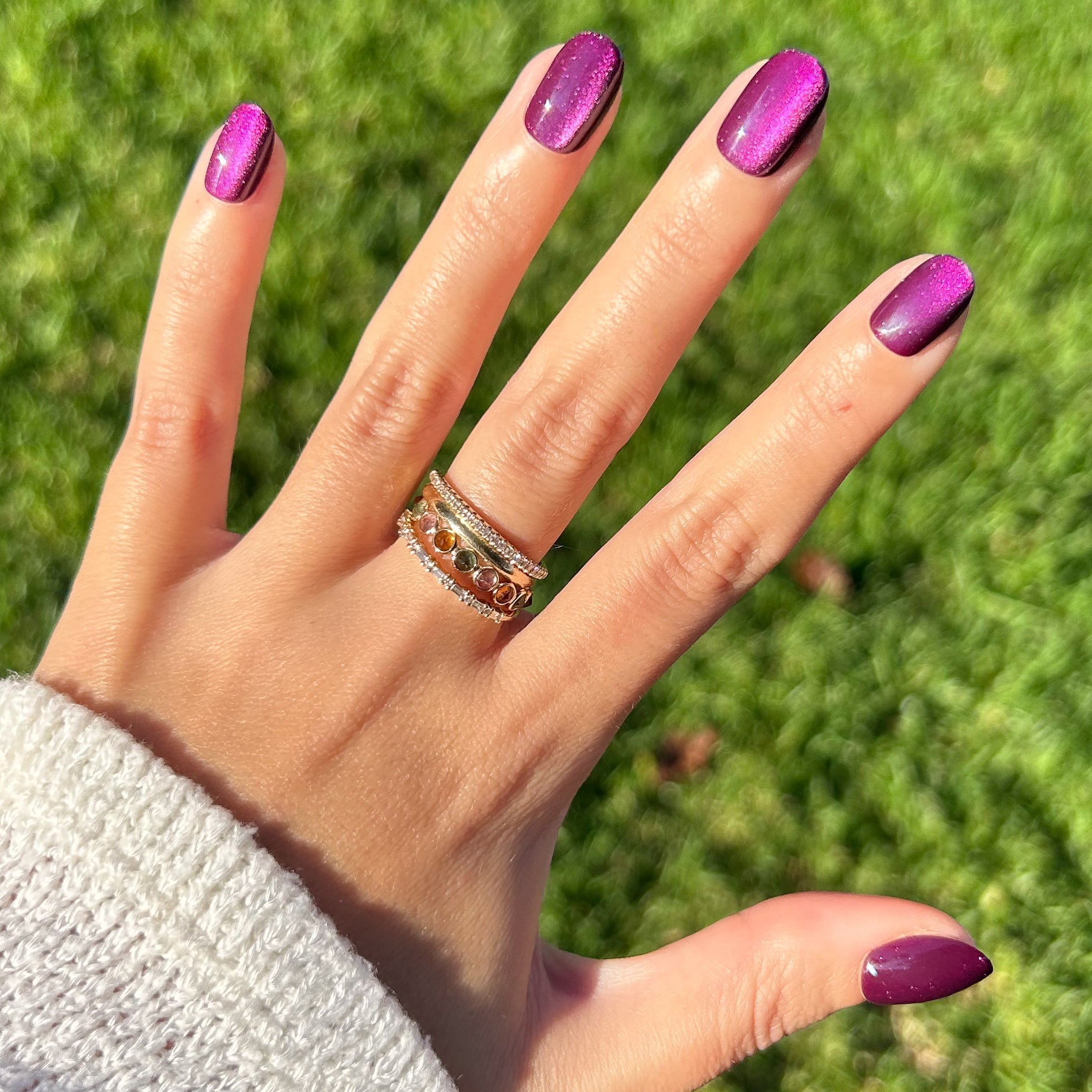 Velvet Plaza - Press-On | Extra Short | Round deep mulberry chrome velvet finish press-on nails on natural hand outdoors