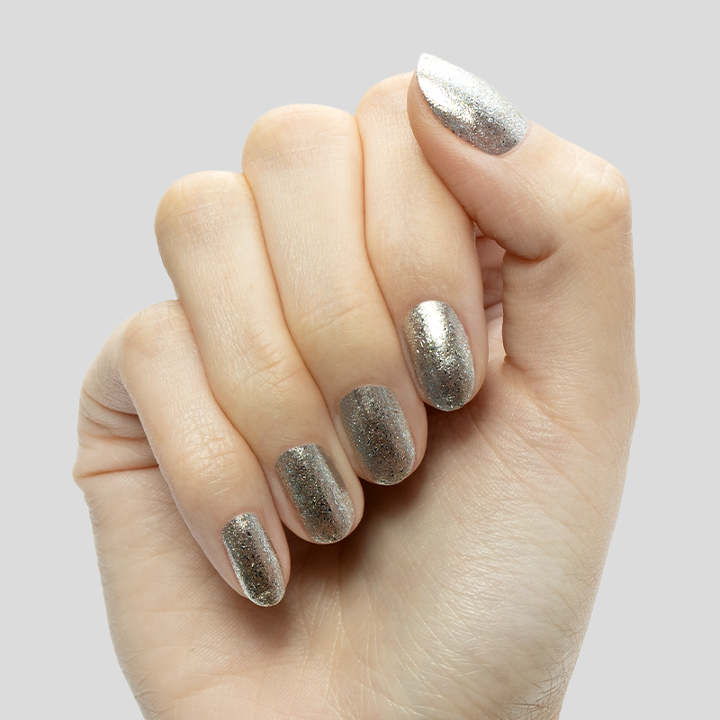 Candy Wrapper crushed metallic silver polish on nails for a shimmering quick dry at home manicure finish