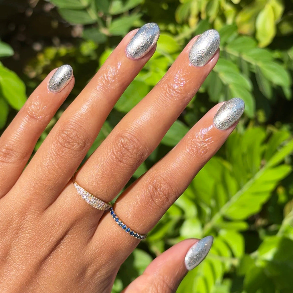 Candy Wrapper metallic silver polish on nails with a shiny, crushed foil effect for a bright quick dry mani at home