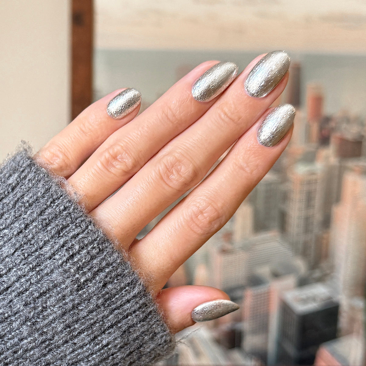 Candy Wrapper crushed metallic silver gel polish on nails with a textured quick dry manicure finish at home