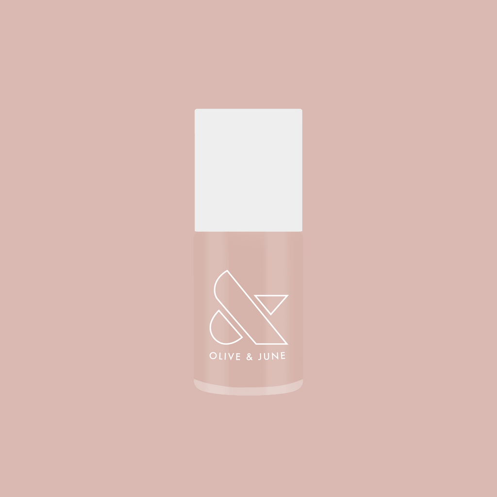 bottle of cold foam pls nail polish in soft neutral beige with subtle shimmer for elegant at home manicure