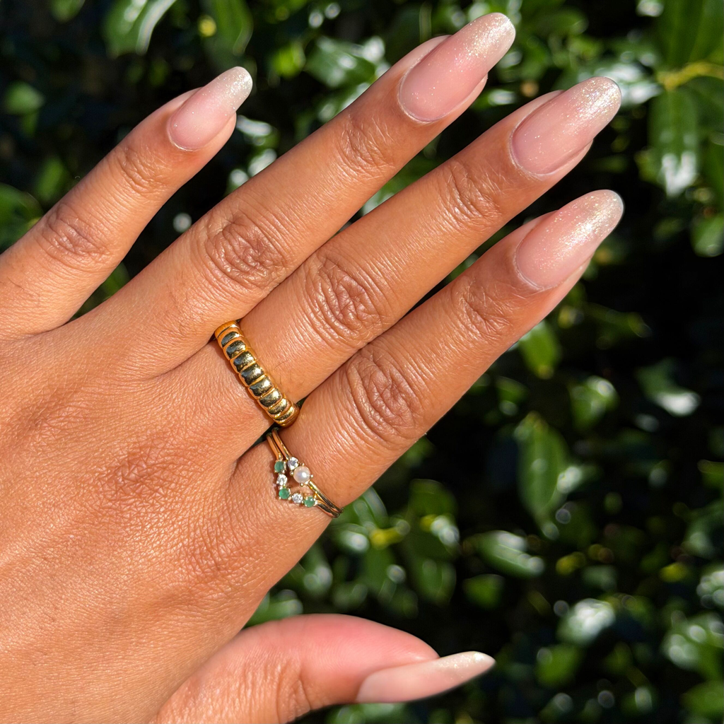 Cookie Swap Gel shimmery beige champagne gel polish on long natural nails for a subtle mani by Olive and June