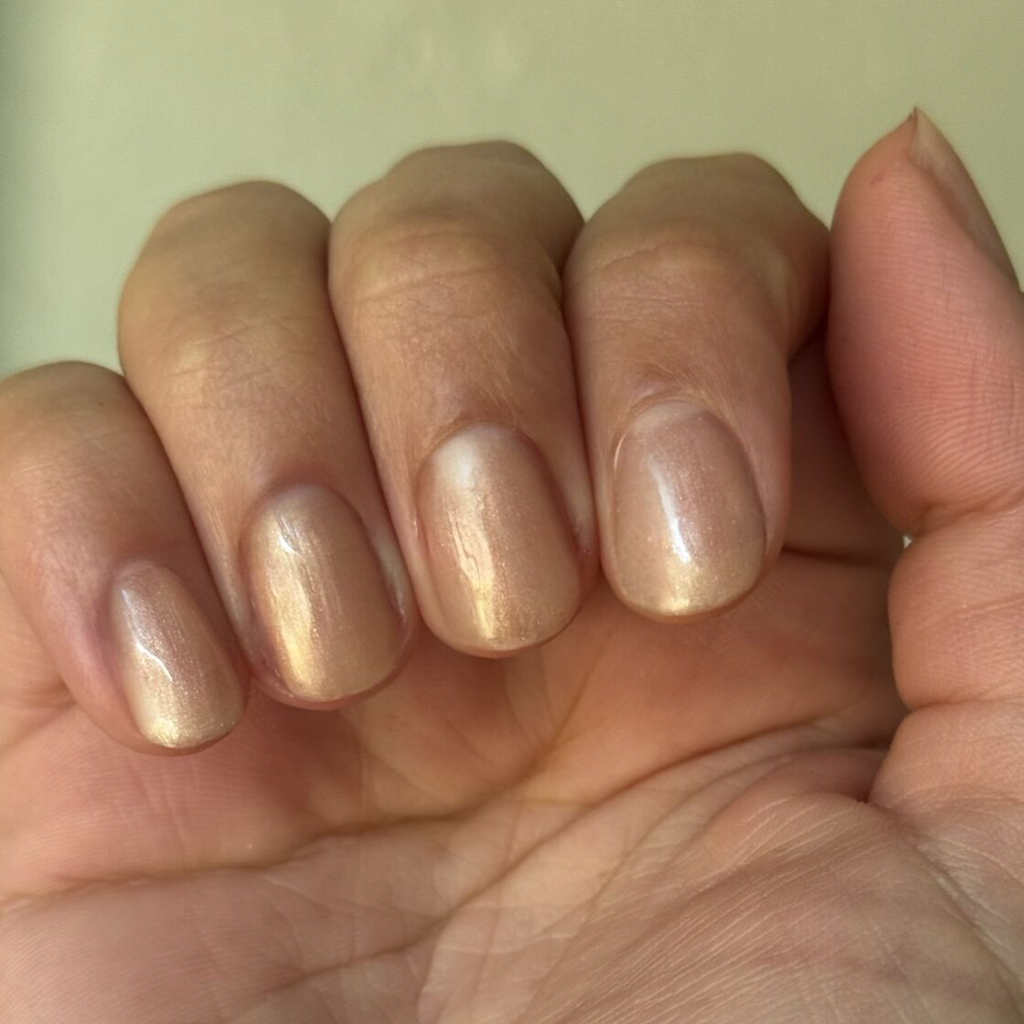 Cookie Swap Gel soft beige champagne gel polish on short natural nails for a smooth manicure by Olive and June