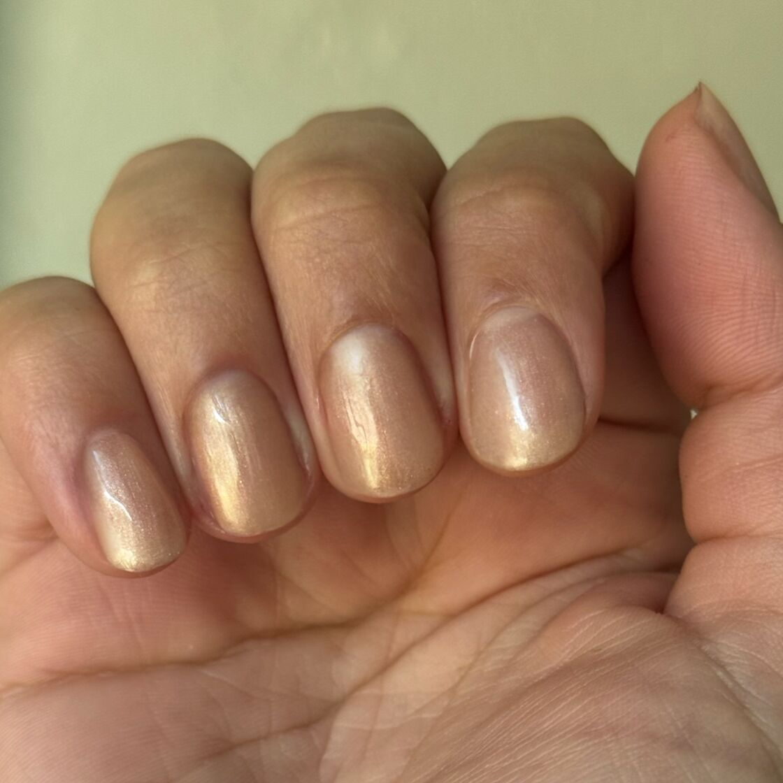 Cookie Swap Gel soft beige champagne gel polish on short natural nails for a smooth manicure by Olive and June