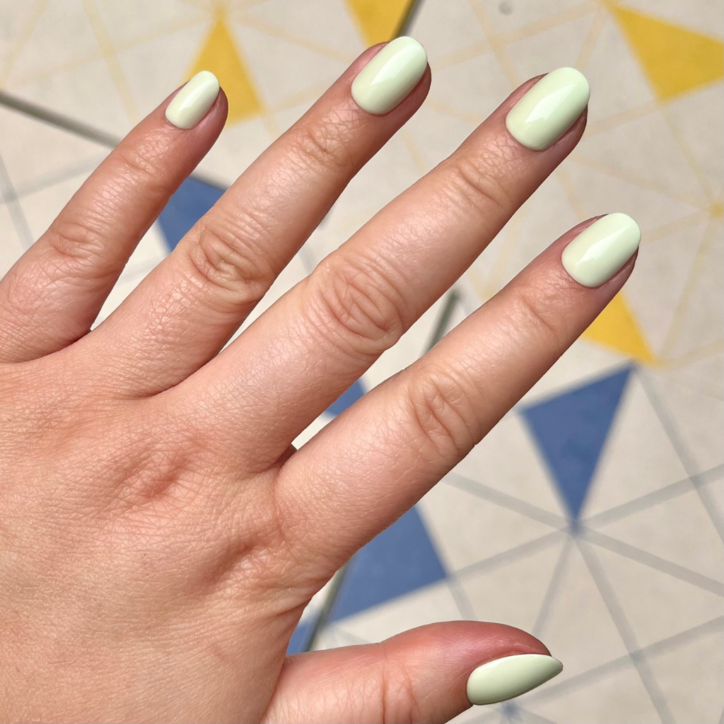 Corrigan | Extra Short | Round - Tab Press-On nails in soft pastel mint green for easy at-home mani and quick application