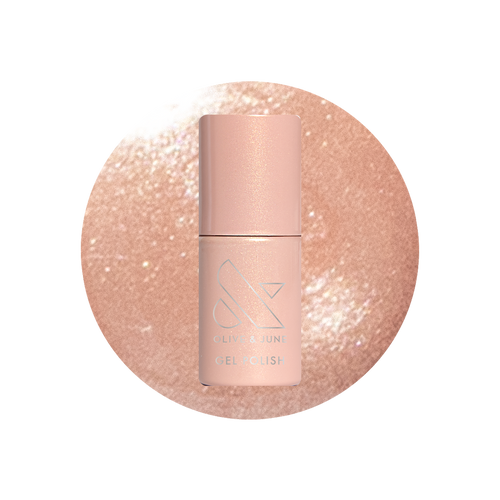Cookie Swap Gel shimmery beige champagne gel polish bottle on sparkling background for a polished manicure