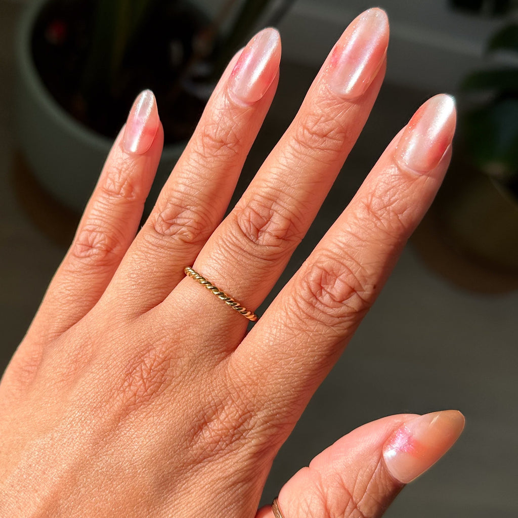 Velvet KAG - Press-On | Medium | Almond neutral peach velvet cateye finish on hand with gold ring natural light