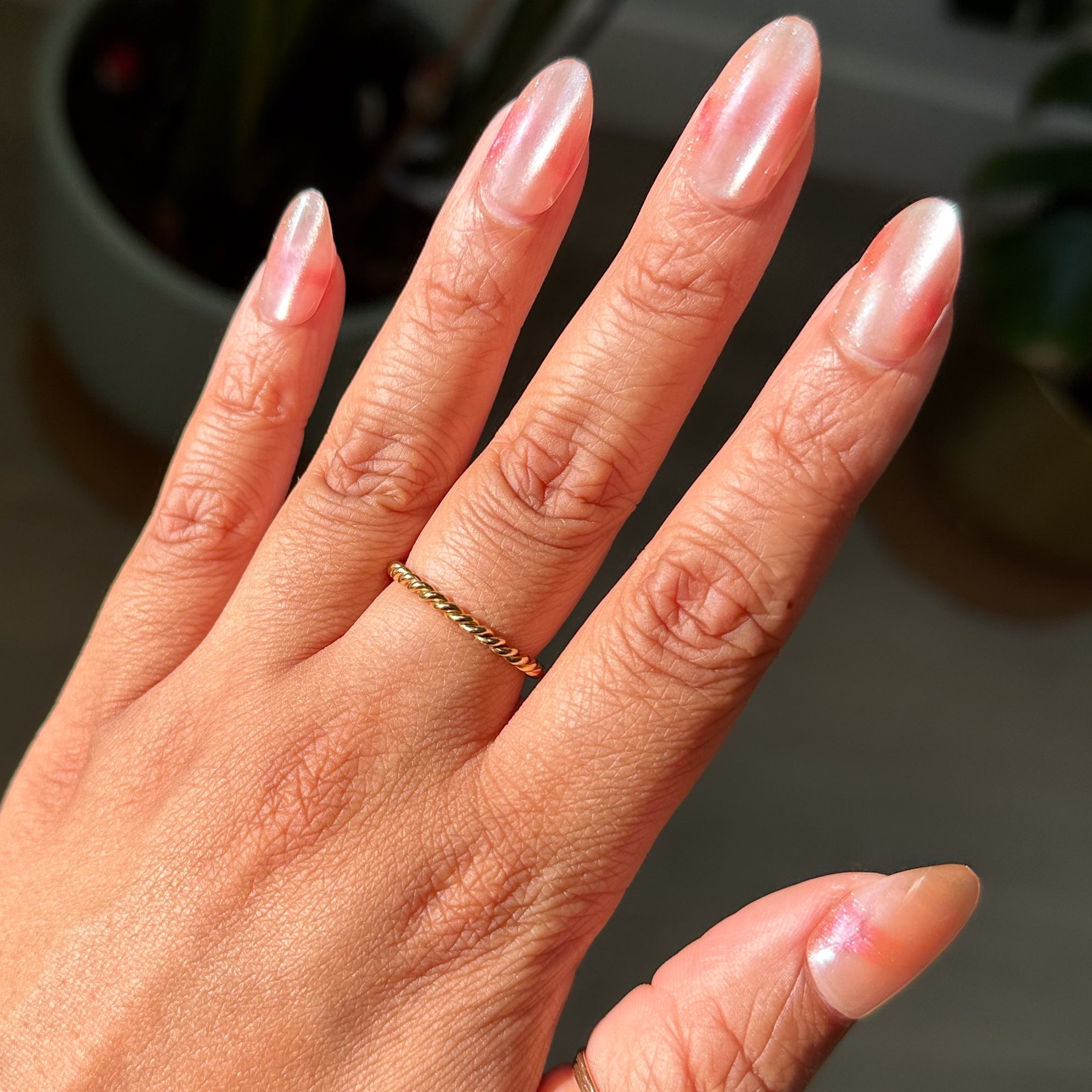Velvet KAG - Press-On | Medium | Almond neutral peach velvet cateye finish on hand with gold ring natural light