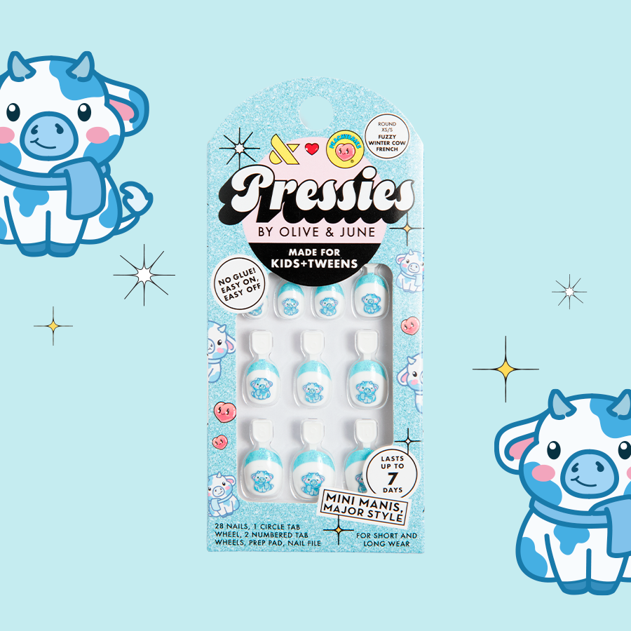 Fuzzy Winter Cow French - Pressies | Extra Short Short | Round showing blue nails with cute fuzzy winter cow designs in packaging