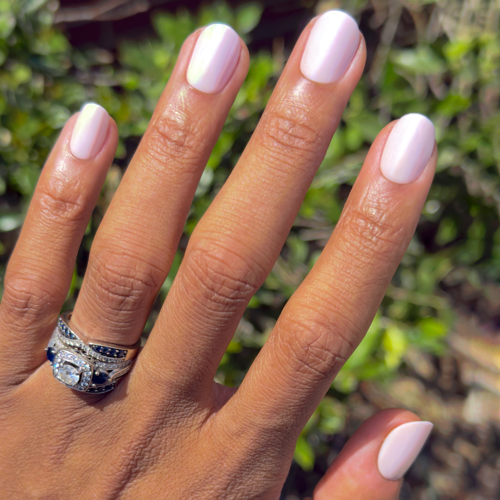 GH Glass - Press-On | Short | Squoval nails in pastel baby pink with shimmering chrome overlay for easy at-home manicure