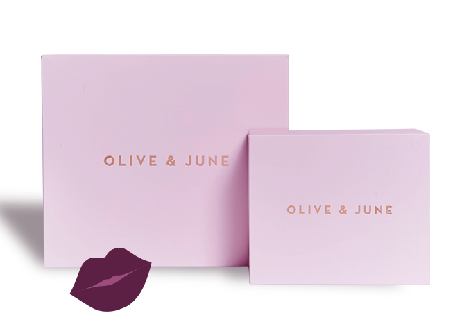 Gift Box with Olive and June branding featuring elegant packaging for at-home mani and pedicure sets