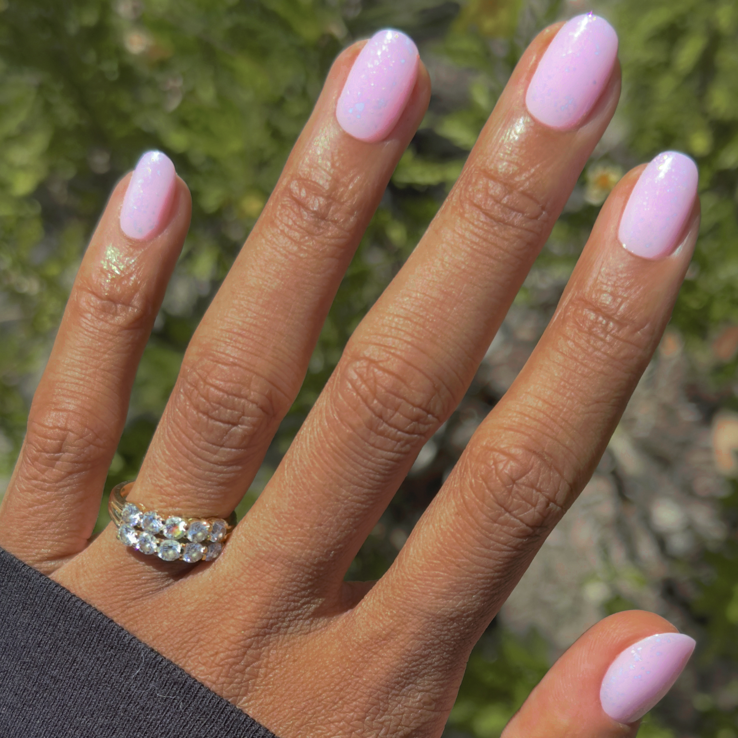 Glitter Cowgirl - Press-On | Short | Round milky lavender false nails with holographic flakes for easy at-home mani