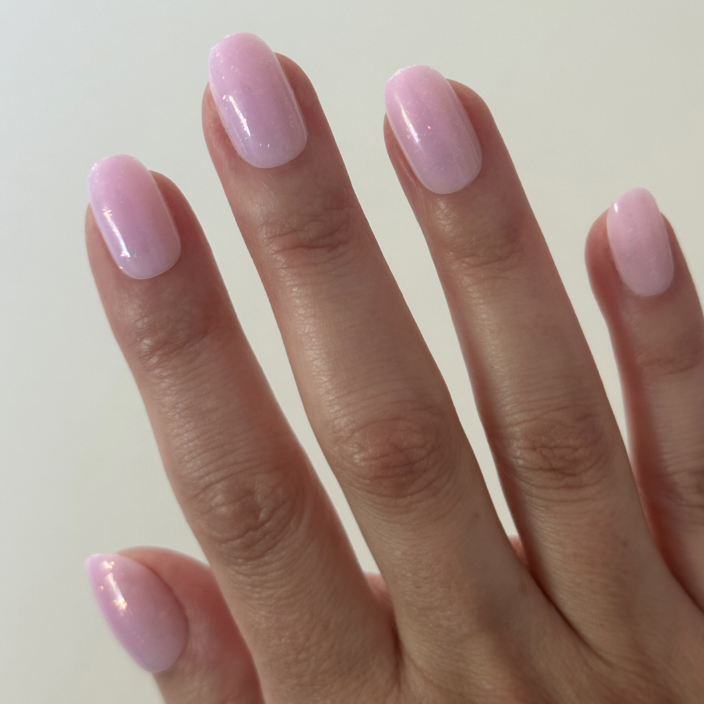 Glitter Cowgirl - Press-On | Short | Round milky lavender nails with holographic flakes for easy at-home manicure