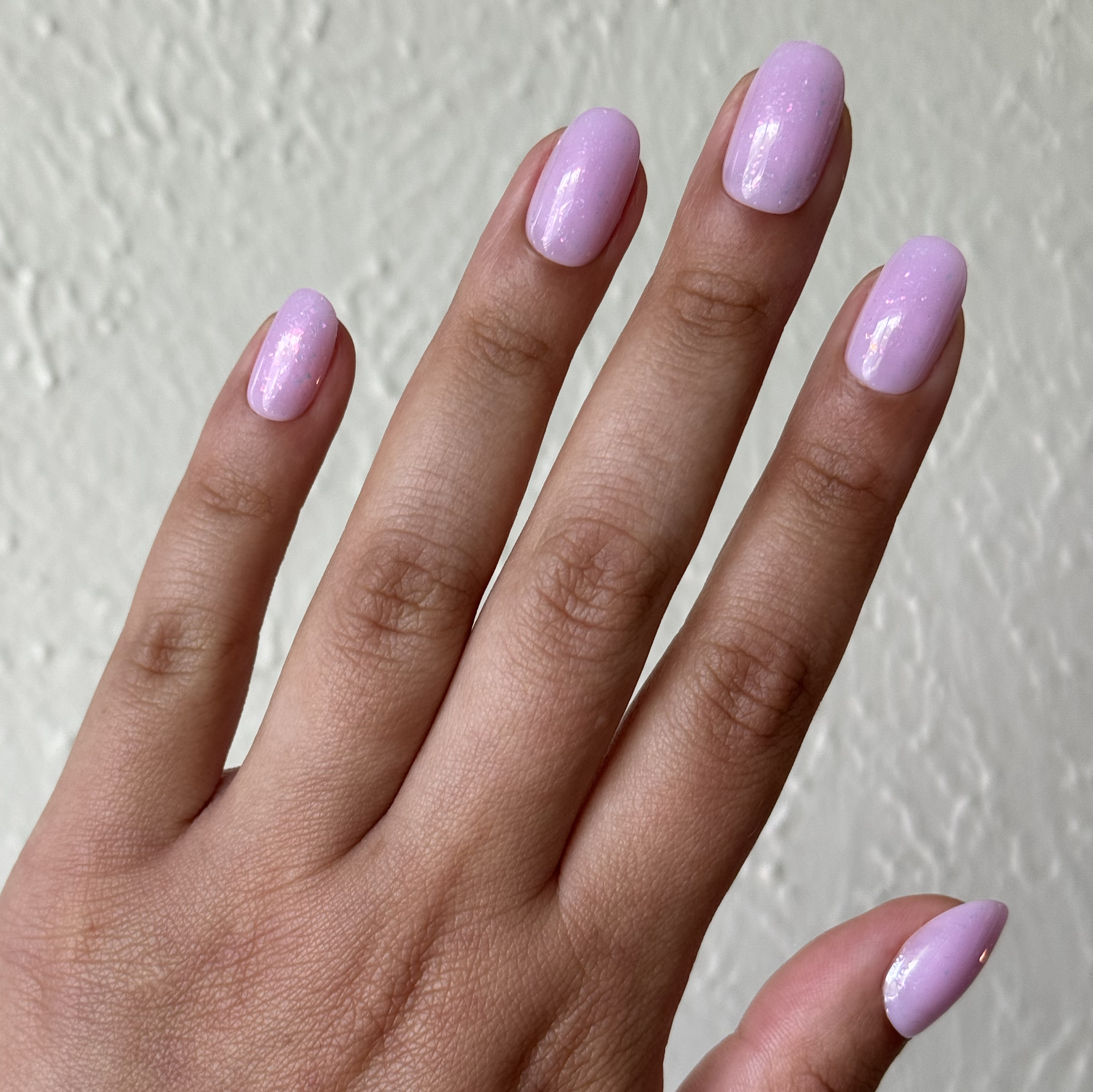 Glitter Cowgirl - Press-On | Short | Round milky lavender short round press-on nails with holographic flakes for easy mani