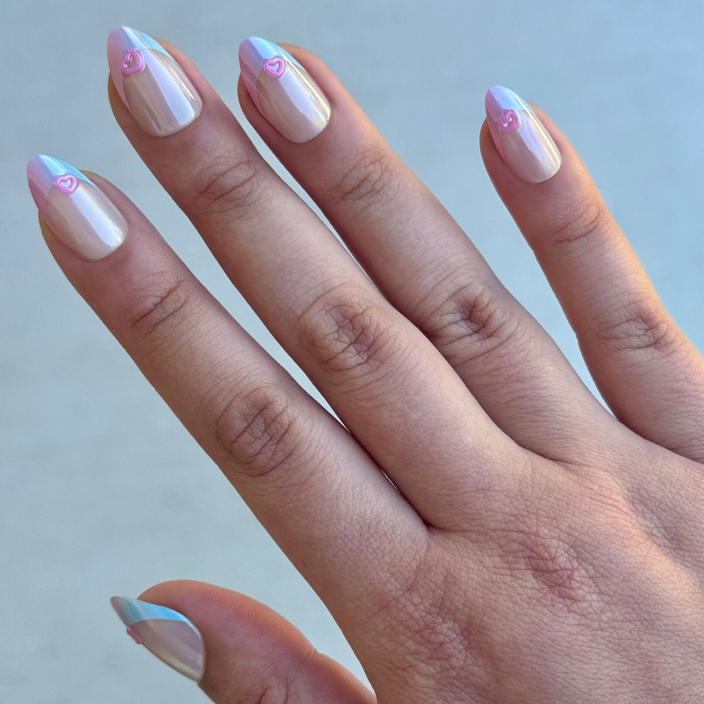 Kawaii Cow Chrome French - Press-On | Medium | Almond showing nails with pearlescent tie dye French tips and raised 3D pink hearts