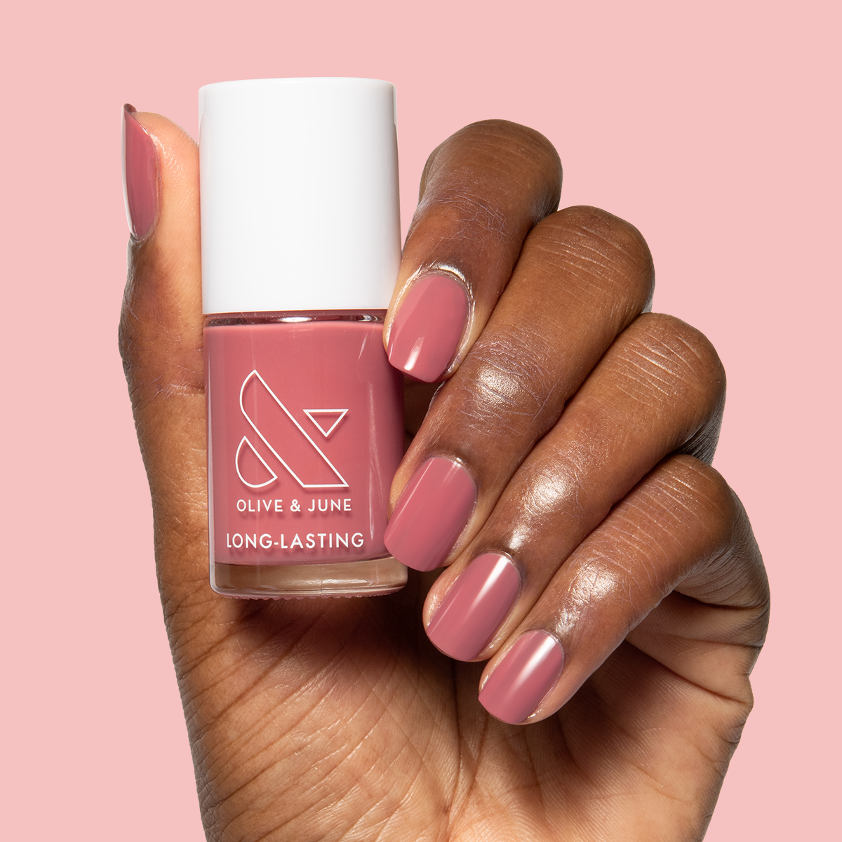 Boysenberry Glass gel polish on medium-length nails showing a sheer berry jelly manicure by Olive and June