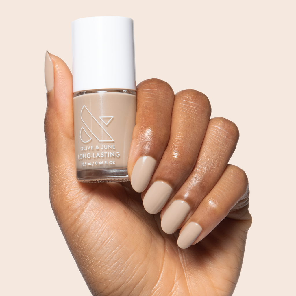 Real Toasty nail polish shown on hand with neutral beige shade for a comfortable, long-lasting mani at home