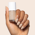 Real Toasty nail polish shown on hand with neutral beige shade for a comfortable, long-lasting mani at home