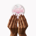 Pink Sands - Press-On | Medium | Oval showing medium oval false nails in soft sun-bleached pink shade on hands
