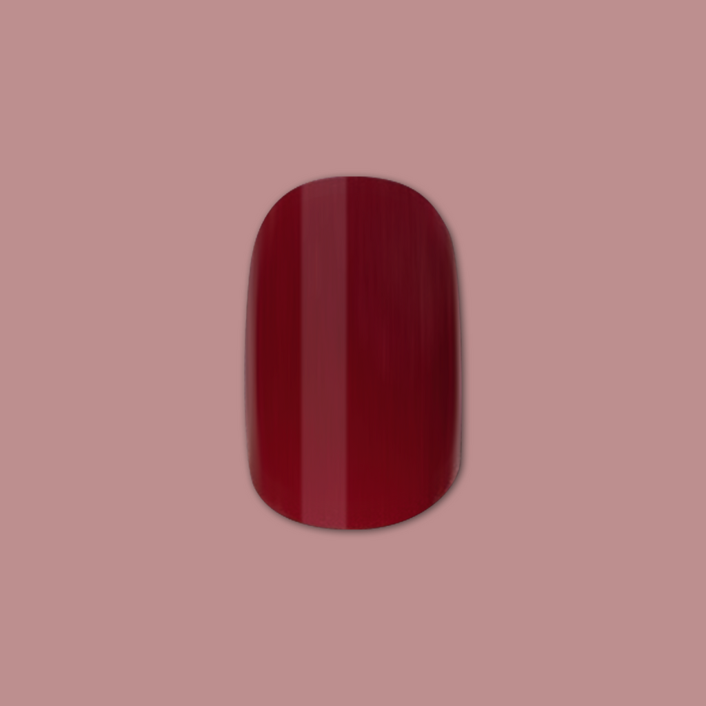 Mulberry | Extra Short | Squoval - Tab Press-On showing deep mulberry maroon glossy press-on nail on pink background