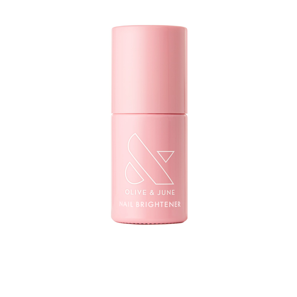 Pink bottle of The Nail Brightener by Olive and June designed to illuminate stained nails with a shimmery finish