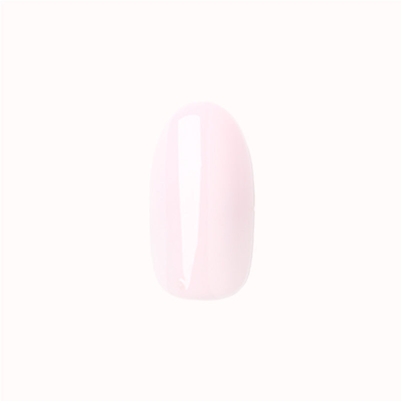Pink Sands - Press-On | Medium | Oval showing a single medium oval false nail in soft sun-bleached pink polish shade