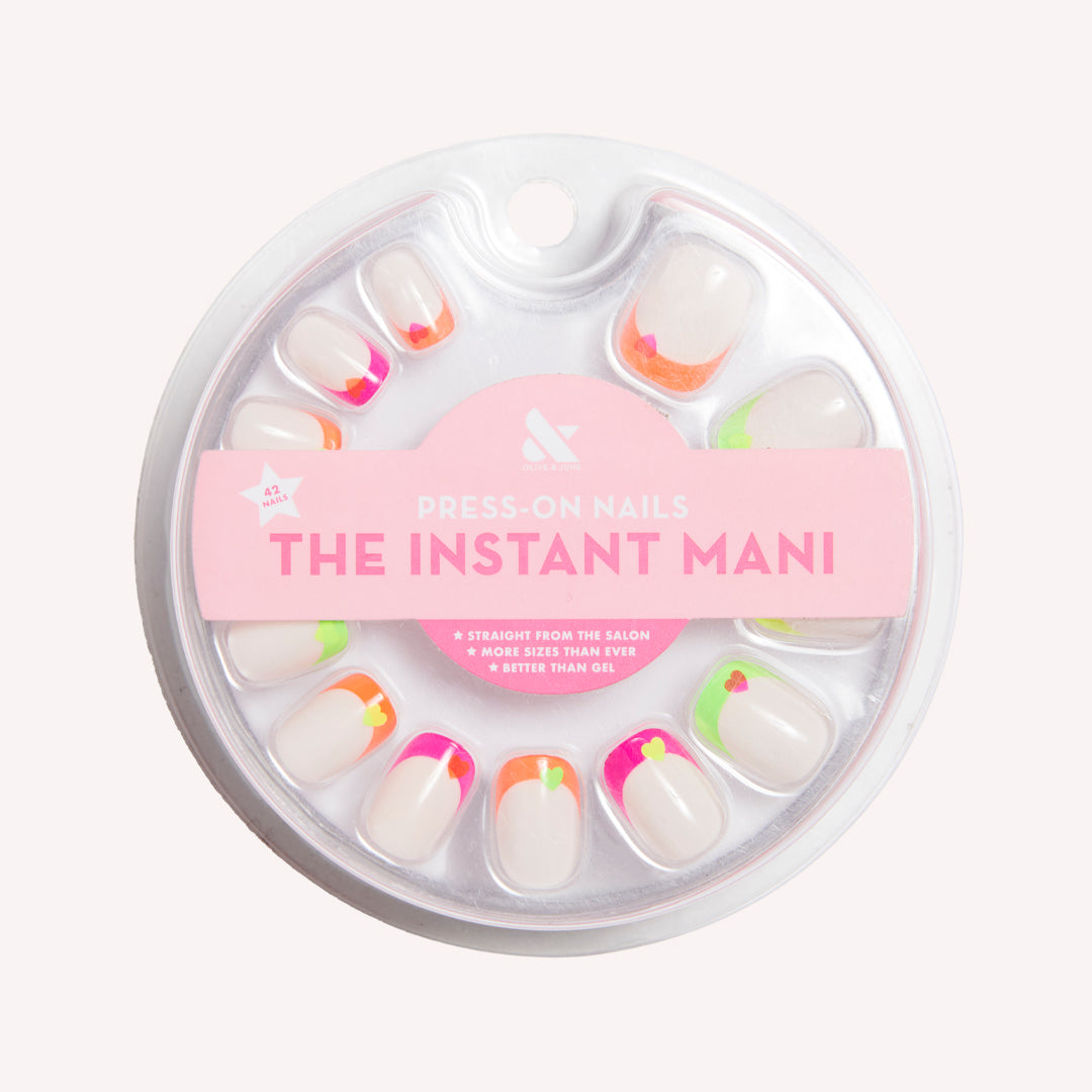 Neon Heart French | Squoval | Extra Short press-on nails with neutral base, neon tips, and contrasting hearts for a quick mani