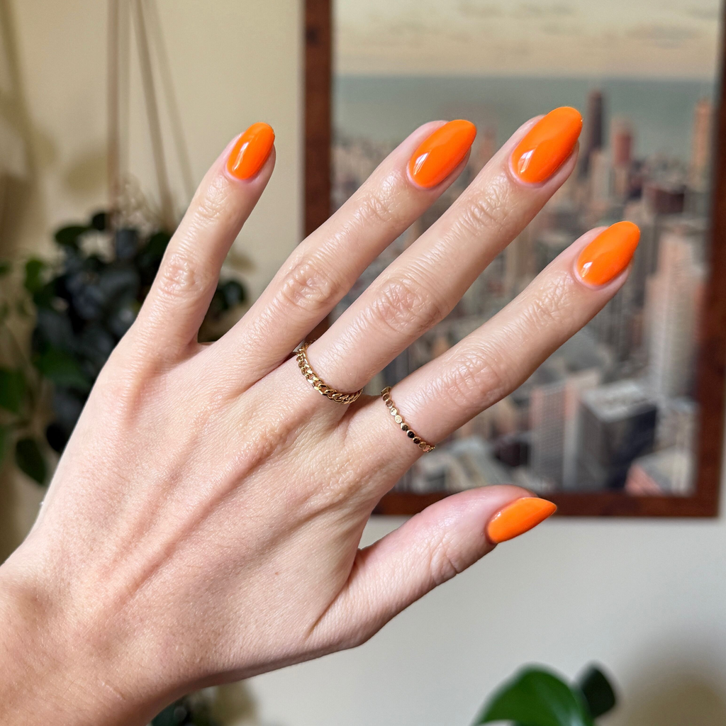 OOO 4EVA - Gel smooth radiant tangerine orange gel polish on medium-length nails with a glossy finish for a vibrant mani