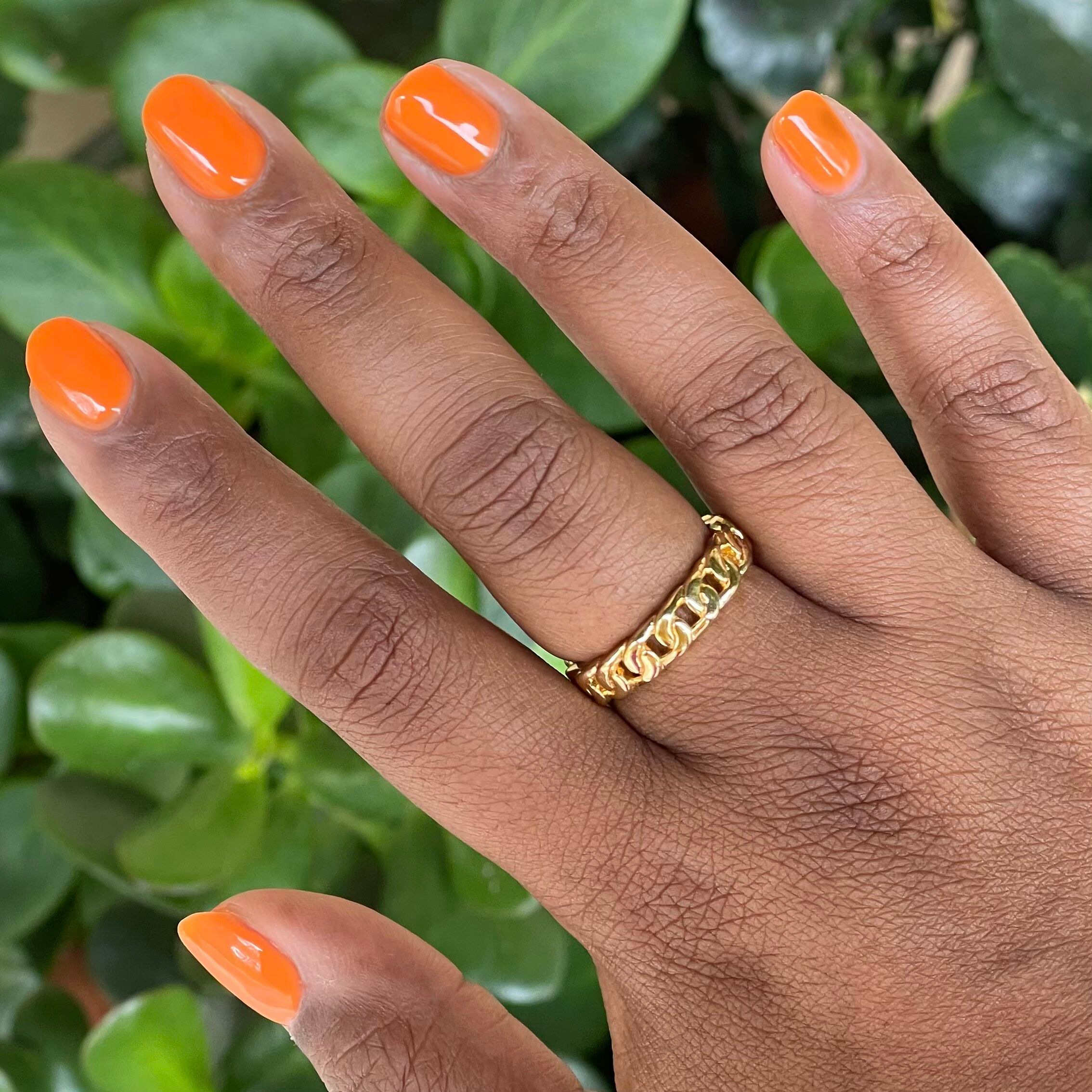 OOO 4EVA - Gel radiant tangerine orange gel polish on natural nails with glossy finish and gold chain ring accessory