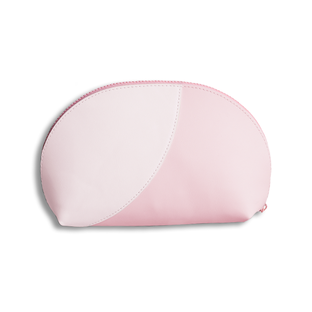 Travel Pouch in soft double pink vegan leather with curved shape, shown flat on white background for mani storage