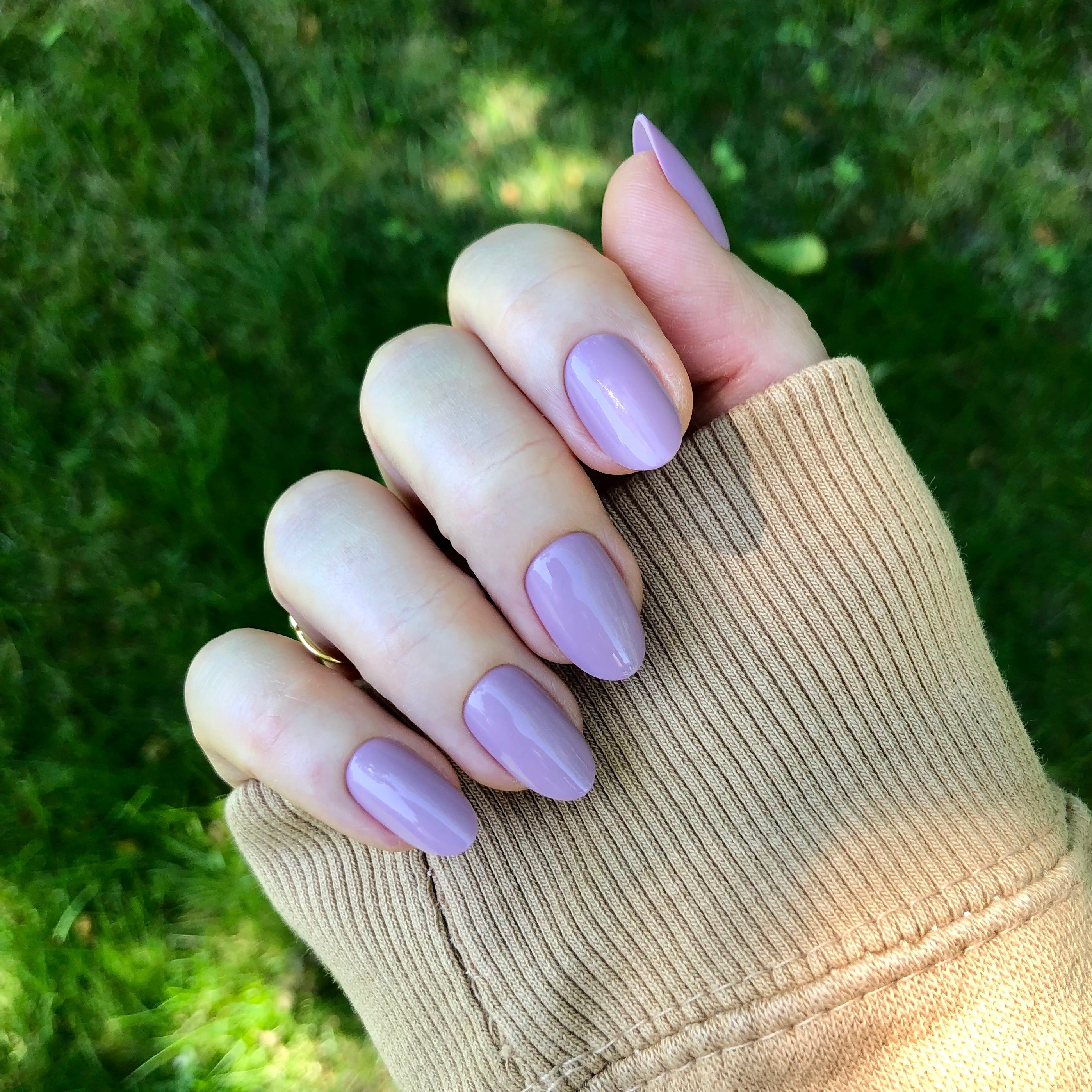 Prairie | Medium | Oval - Tab Press-On displaying medium oval purple press-on nails for a simple at home manicure
