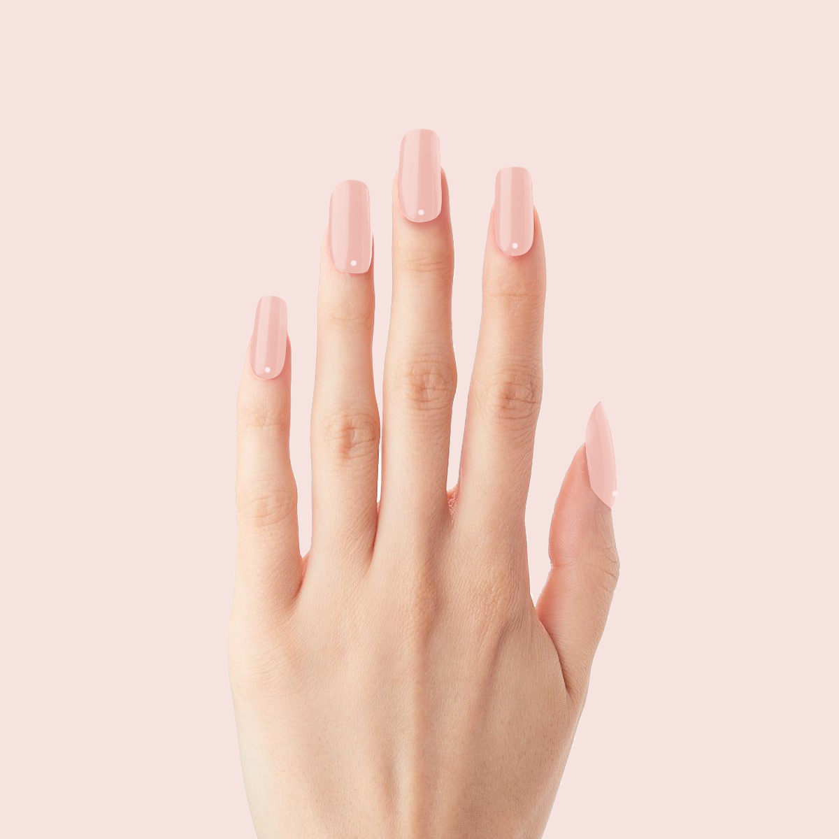 Minimalist Dot - Press-On | Long | Squoval with sheer pink long nails and subtle single dot detail on hand against pale pink background