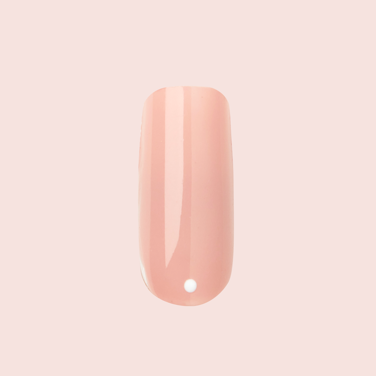 Minimalist Dot - Press-On | Long | Squoval sheer tan long squoval press-on nail with a single white dot accent on pale background