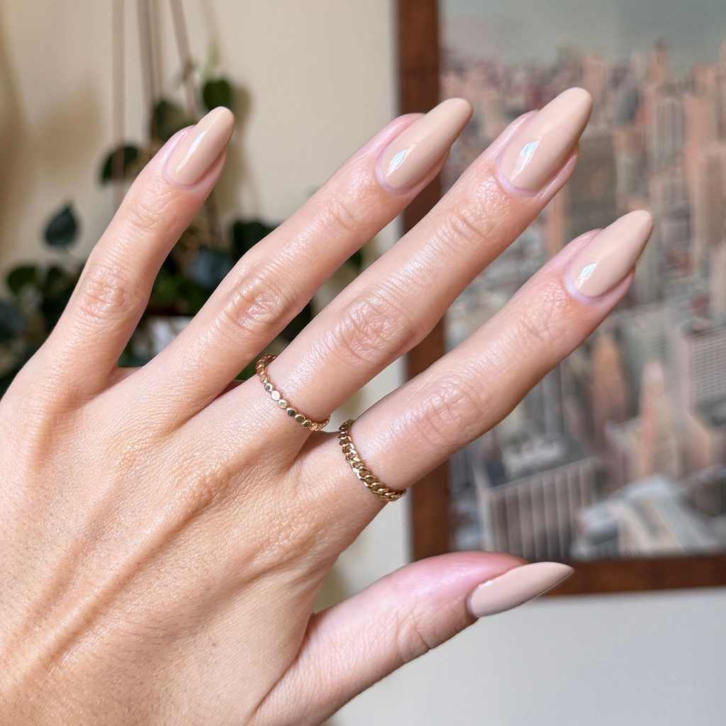 Real Toasty gel polish on nails in a toasted beige shade offering a smooth, natural-looking mani at home.