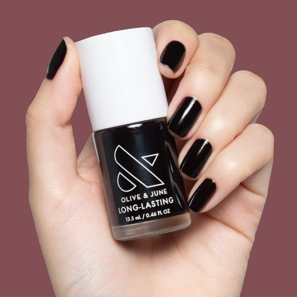 Shop Til You Drop vampy dark red gel polish on short natural nails for a sleek manicure by Olive and June