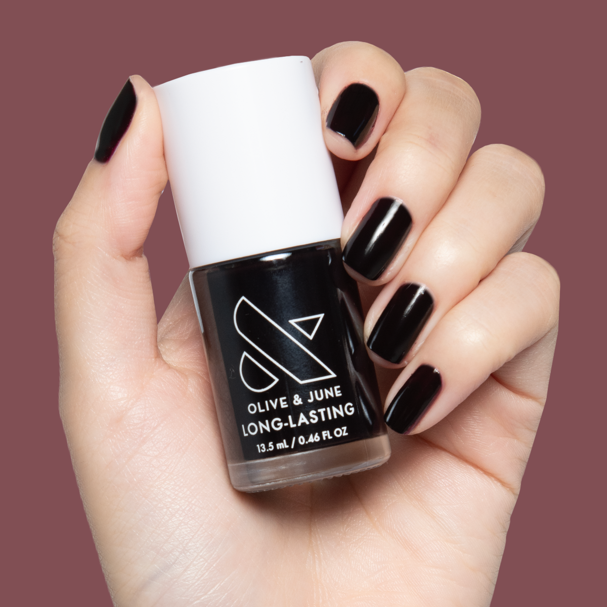 Shop Til You Drop vampy dark red gel polish on short natural nails for a sleek manicure by Olive and June