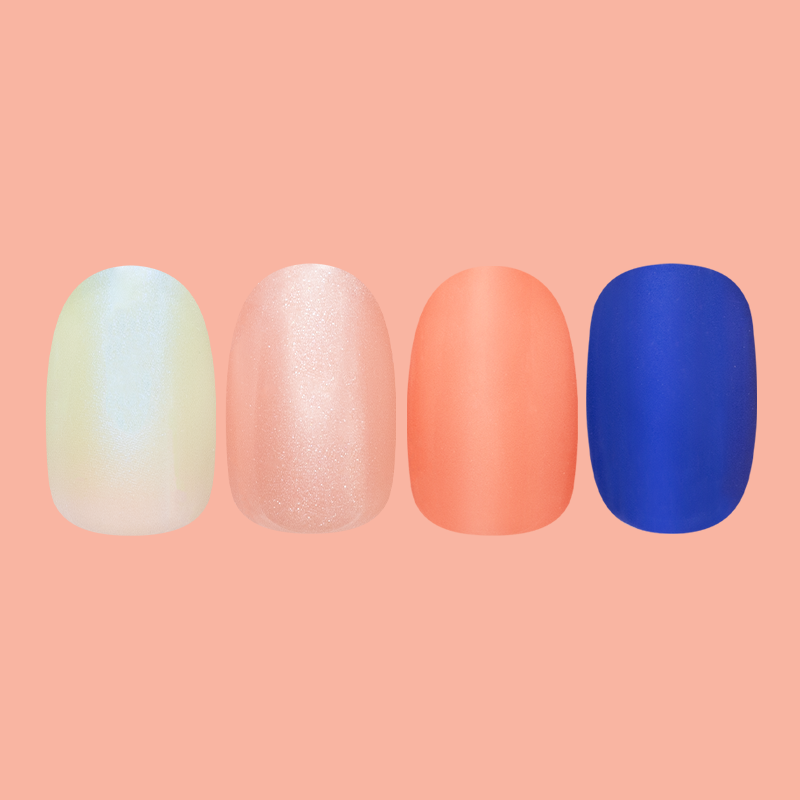 Spring/Summer ‘25 Super Stick Set showing four false nails in shimmer mint, soft pink, coral, and vibrant blue for easy at-home mani