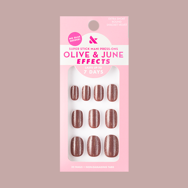 Shacket Velvet | Extra Short | Round - Tab Press-On nails in warm neutral rose with a magnetic velvet finish in packaging