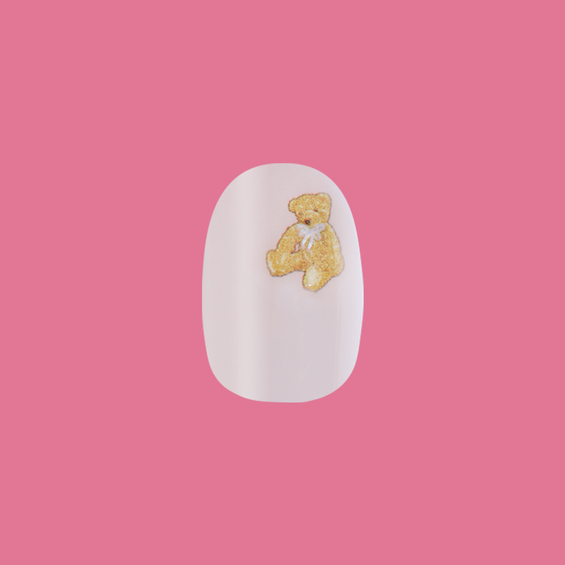 Tiny Teddy Hearts - Press On | Short | Round nail with soft pinky-beige base and a detailed teddy bear accent for an easy mani