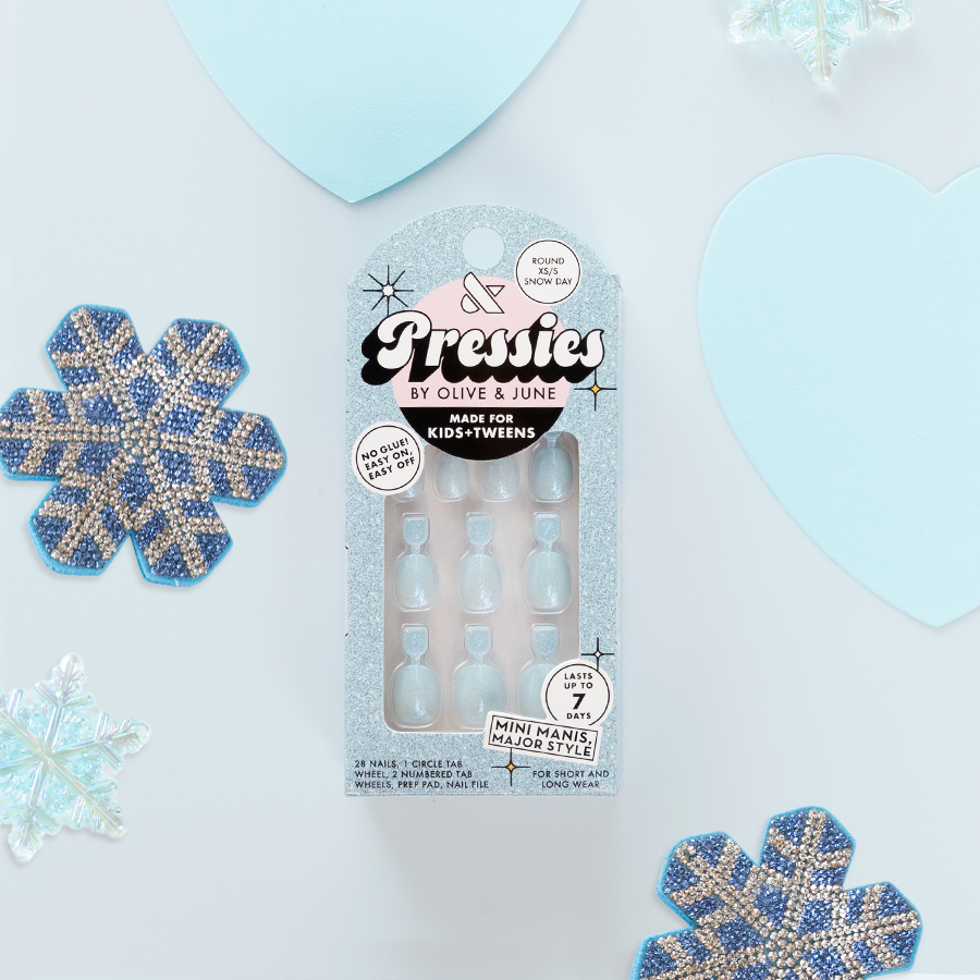 Snow Day - Pressies | Extra Short Short | Round showing icy blue mini press-on nails in kid-friendly packaging with wintry accents