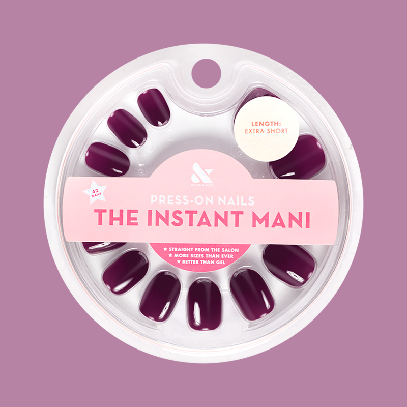Pack of extra short round press-on nails in dark purple shade Who Likes Raisins? - Press-On | Extra Short | Round by Olive and June